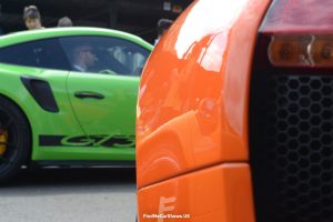 Green Porsche 911 Gt3 And Orange Lamborghini Murcielago Rear At Supercar Fest
